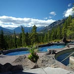 Outdoor hot pools at Hidden Ridge overlooking Banff, Alberta.